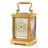 Miniature brass carriage clock with porcelain panels and Roman numeral dial, 6cm high