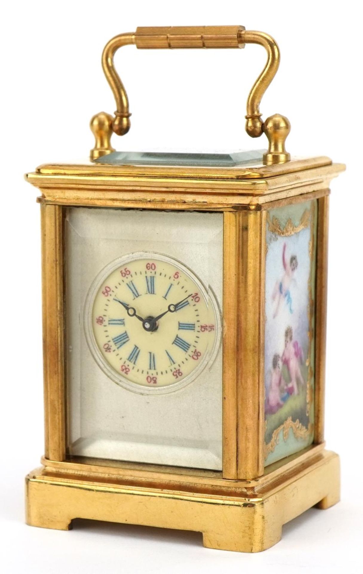 Miniature brass carriage clock with porcelain panels and Roman numeral dial, 6cm high