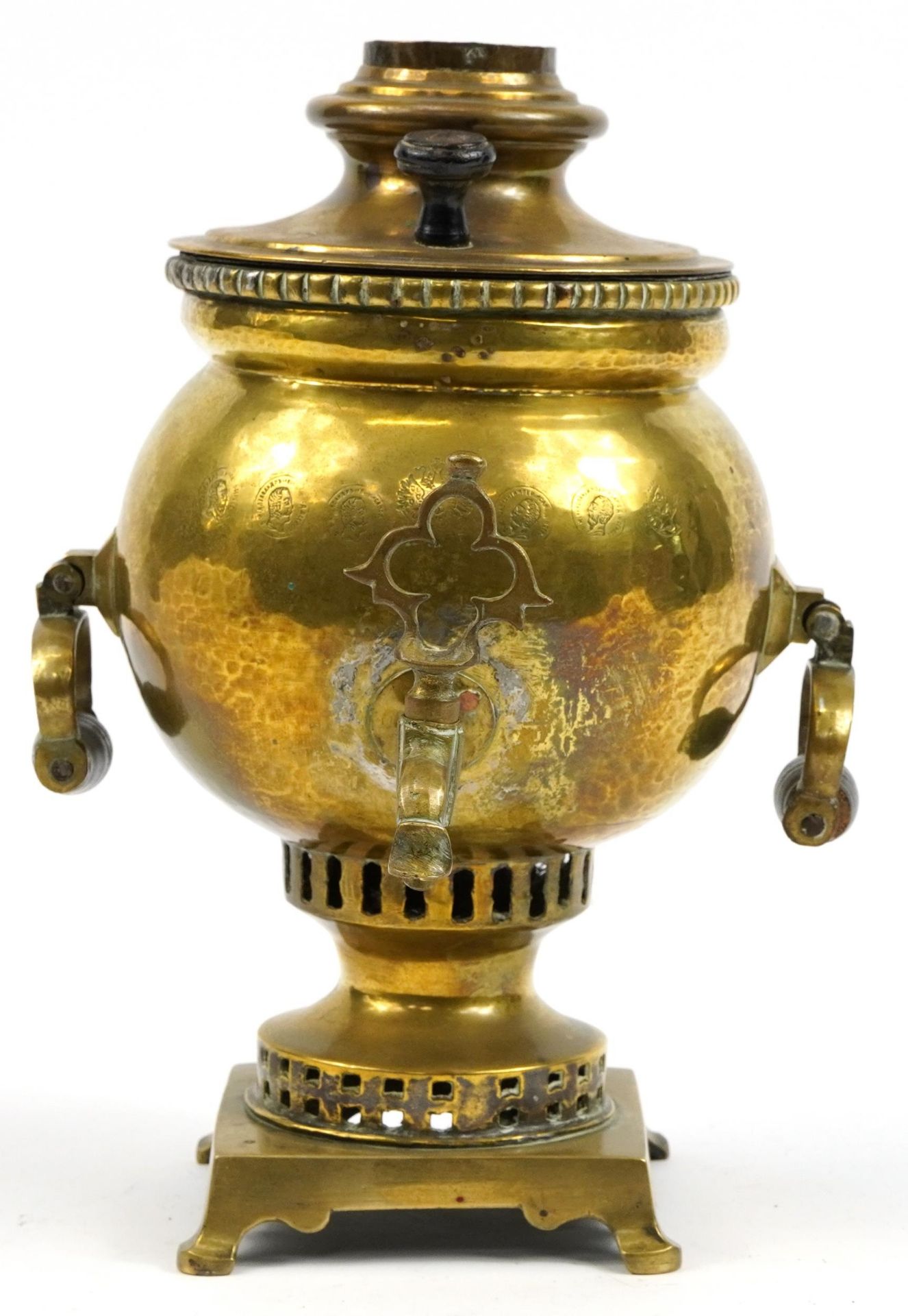 Russian brass samovar with ebonised mounts and impressed marks, 30cm high