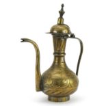 Turkish brass coffee pot engraved with flowers, 26.5cm high