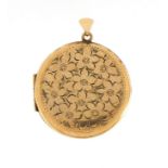 9ct gold circular locket with engraved floral decoration, 4.5cm high, 12.5g