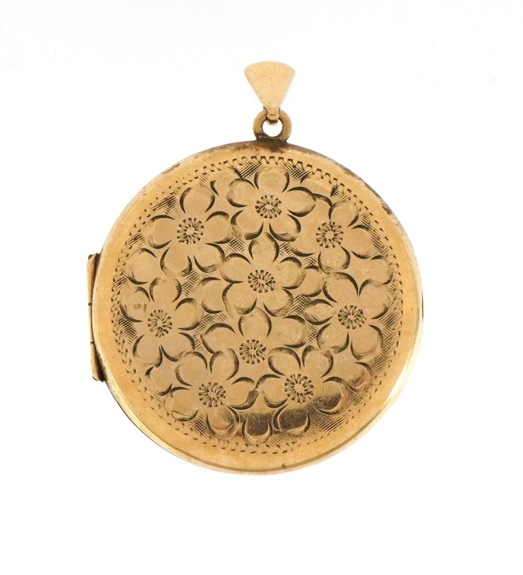 9ct gold circular locket with engraved floral decoration, 4.5cm high, 12.5g