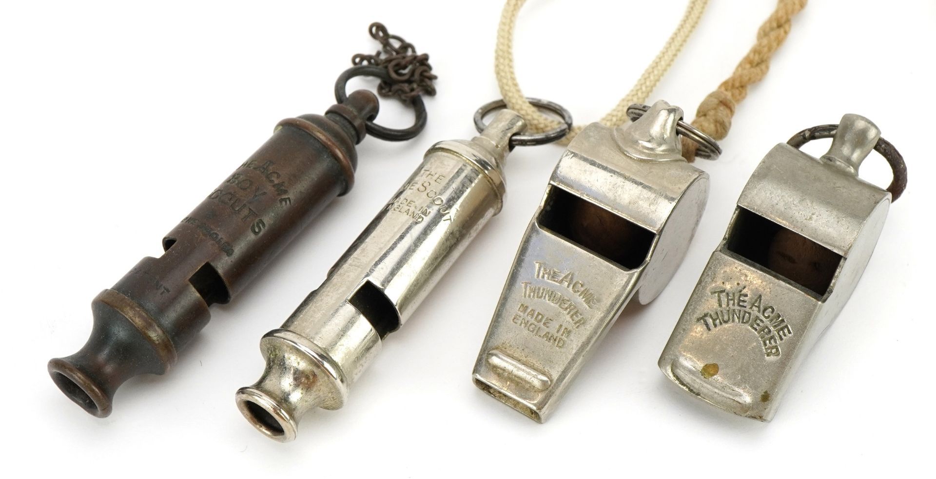 Brass Acme metal scout whistle and two Acme Thunderers, the largest 7.5cm