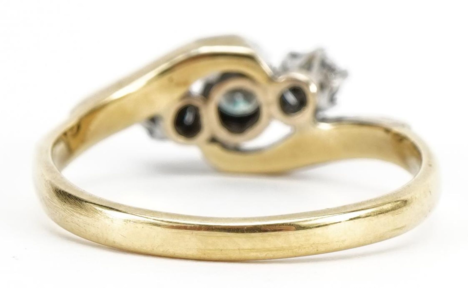 18ct gold and platinum diamond three stone crossover ring, the largest diamond approximately 2.4mm - Image 2 of 3