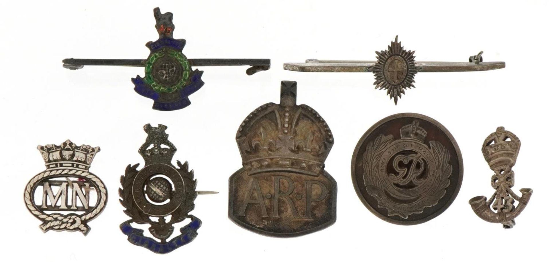 Military and naval interest silver brooches and lapels including tortoiseshell Royal Engineers,