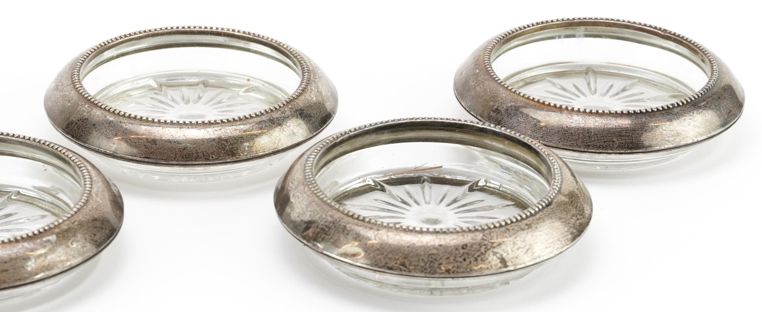 Frank M Whiting, set of seven circular sterling silver mounted dishes, 10cm in diameter - Image 3 of 4