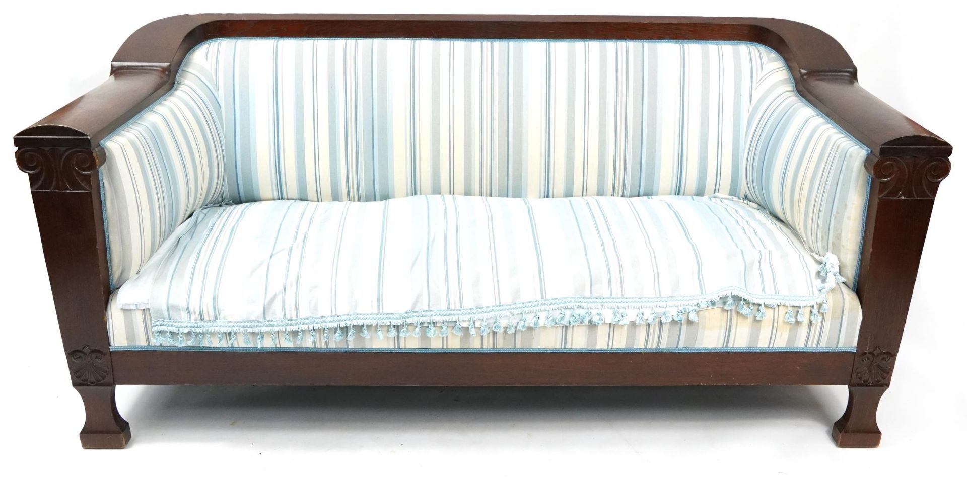 Carved mahogany framed settee with blue striped upholstery, 185cm wide