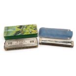 Two vintage harmonicas comprising The Echo Harp by Hohner and Bandmaster Tremold