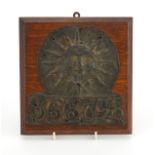 Antique lead fire insurance plaque on oak back the plaque numbered 366798, overall 21.5cm x 20.5cm