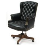 Mahogany framed captain's chair with black leather button upholstery, 109cm high