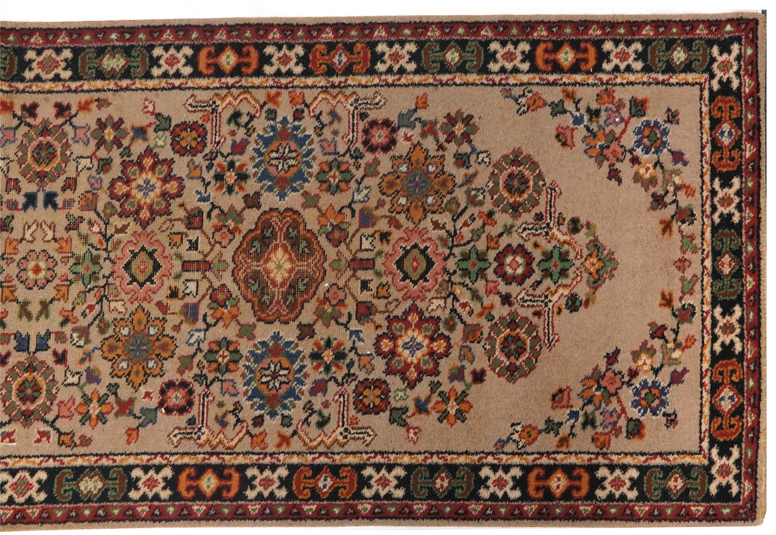 Rectangular floral carpet runner the central field having a beige ground, 270cm x 90cm - Image 4 of 5