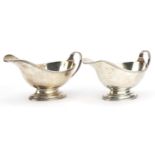 Samual Walton Smith & Co, pair of George V silver sauce boats, each 18cm wide, total 311.1g