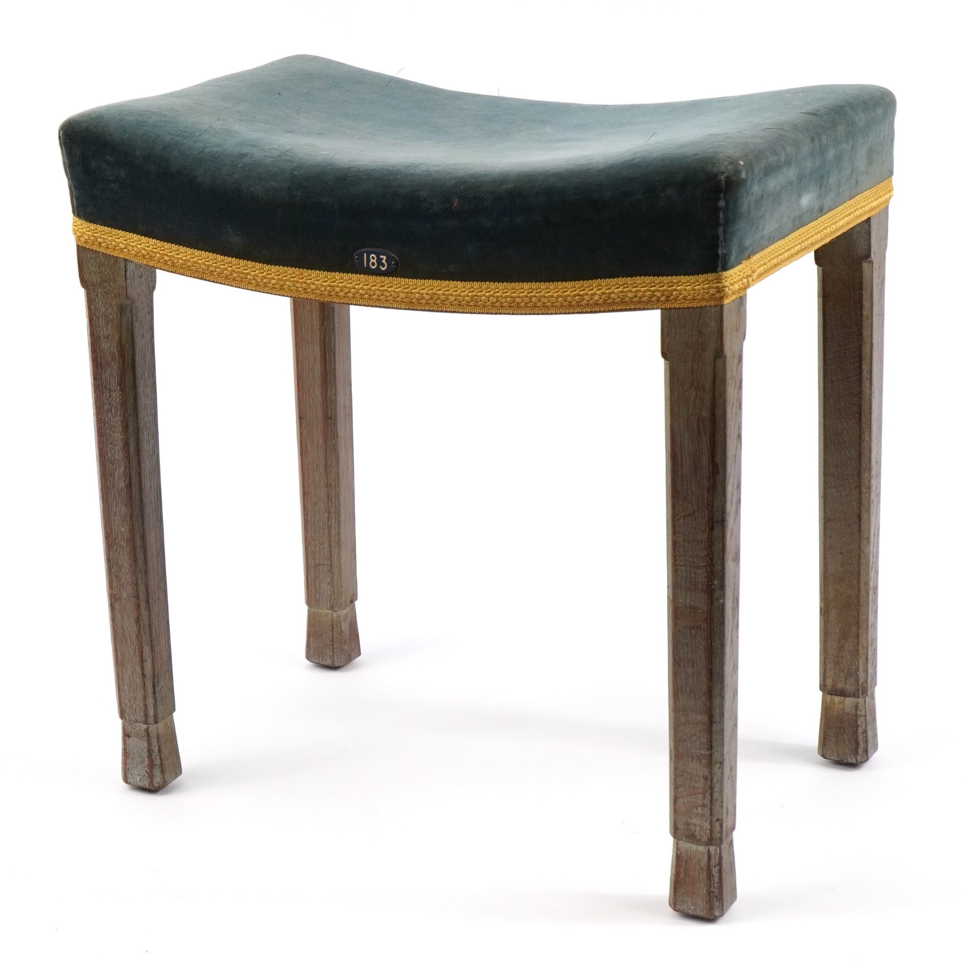 Elizabeth II oak framed Coronation stool with blue upholstered seat, impressed Glenister Wycombe and