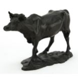 L. Carvin, patinated bronze cow, 13.5cm in length