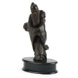 Chinese root wood carving of an elder raised on a later oval ebonised base, overall 23.5cm high