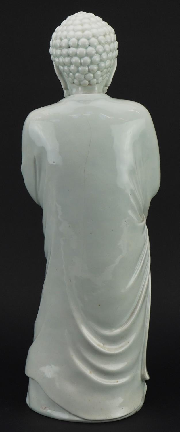 Large Chinese porcelain figure of a Buddhist god having a blanc de chine glaze, 43.5cm high - Image 2 of 3