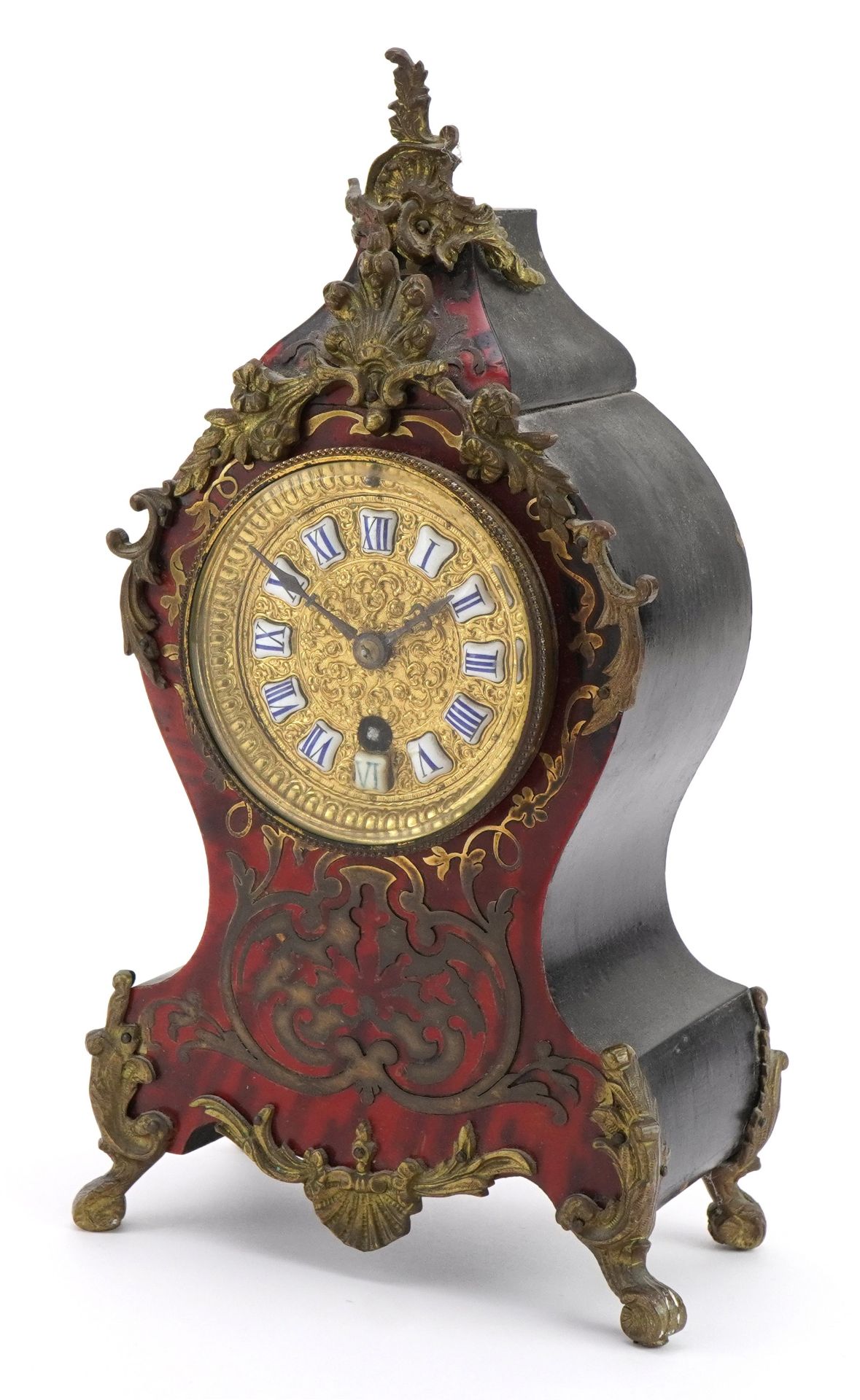 19th century French ebony and boulle work cartouche shape mantle clock with ornate brass mounts, the