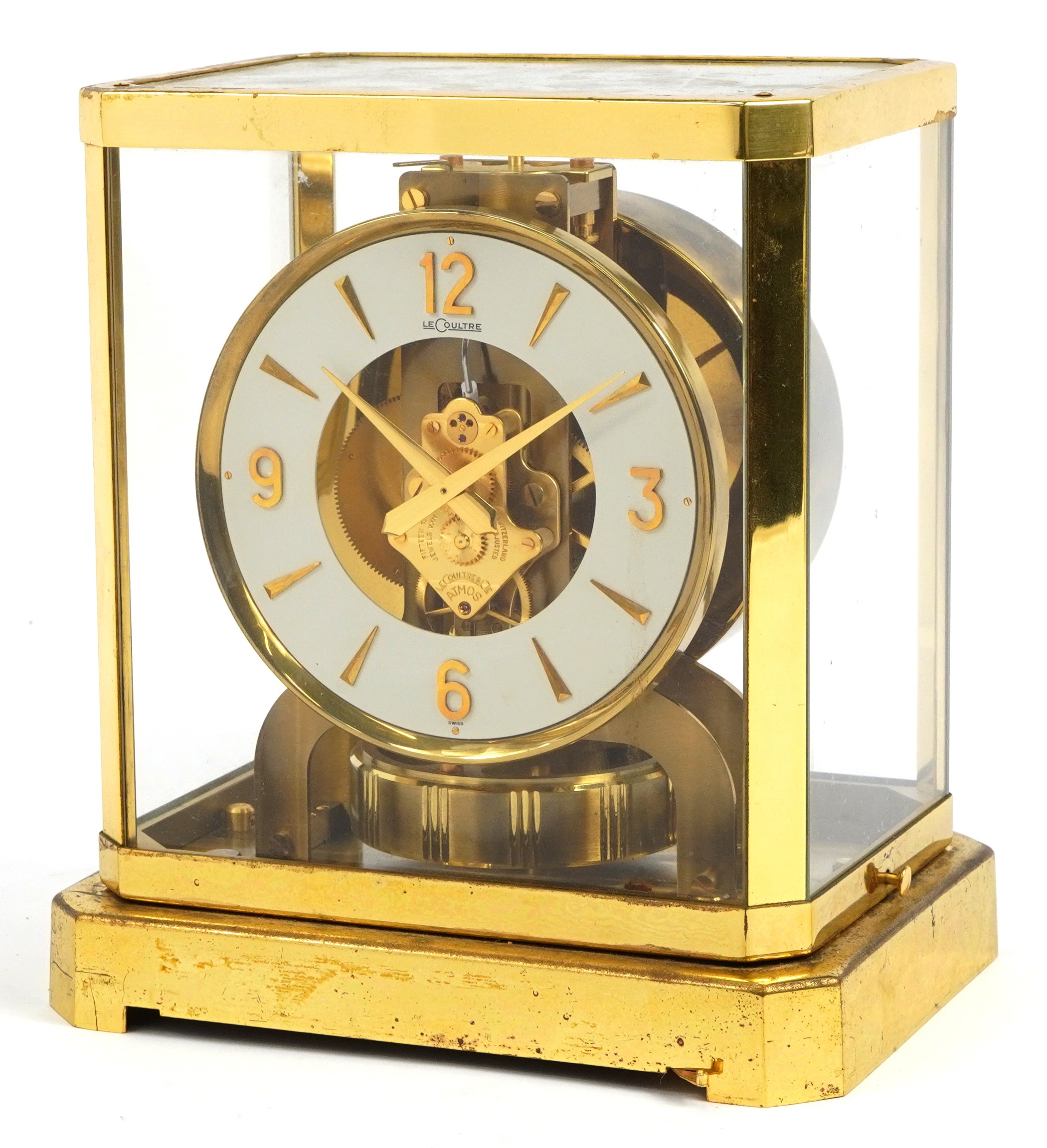 Jaeger LeCoultre brass cased Atmos clock, the circular chapter ring having Arabic numerals, serial