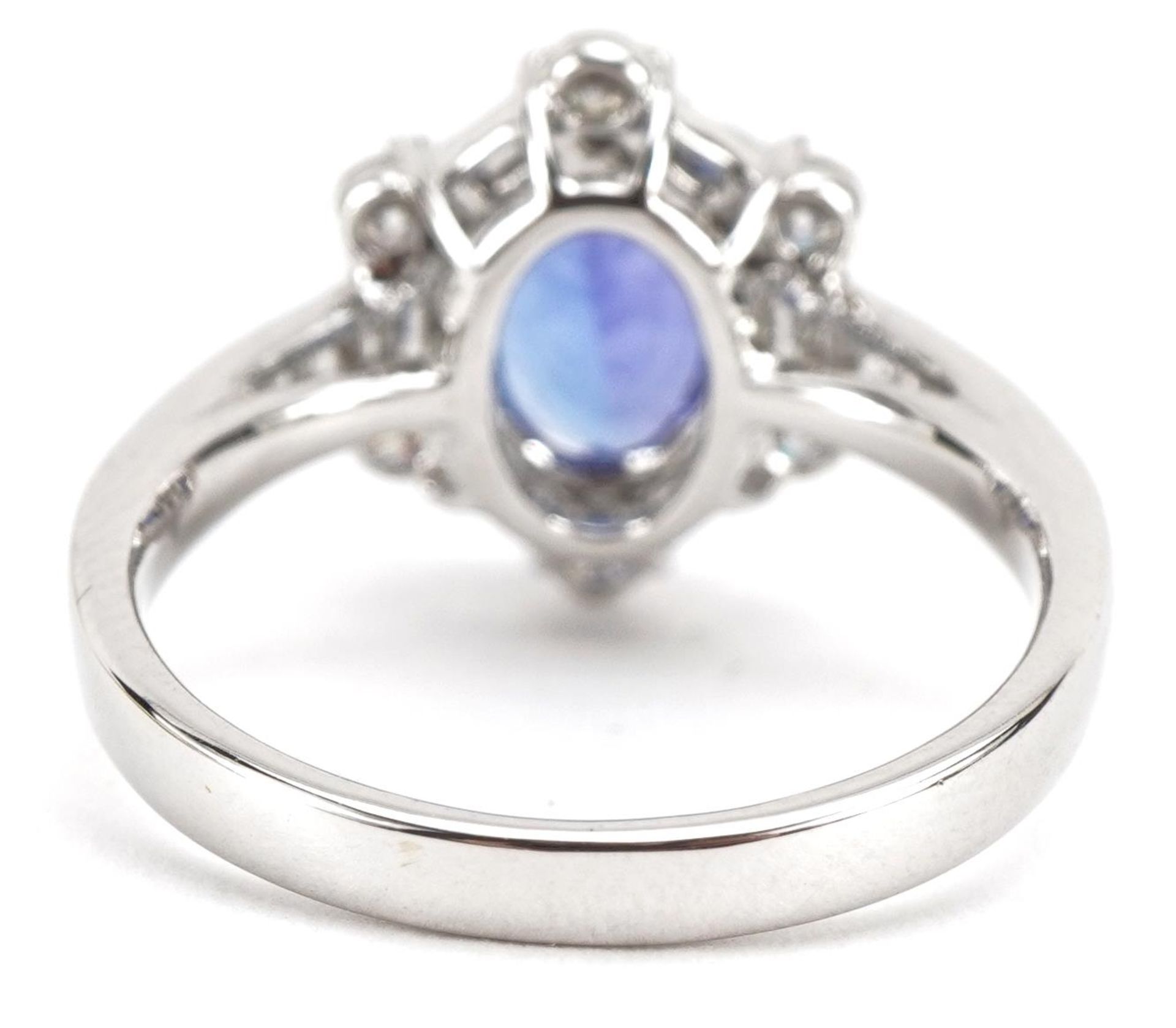 18ct white gold tanzanite and diamond halo ring with baguette cut shoulders, total tanzanite - Image 2 of 3