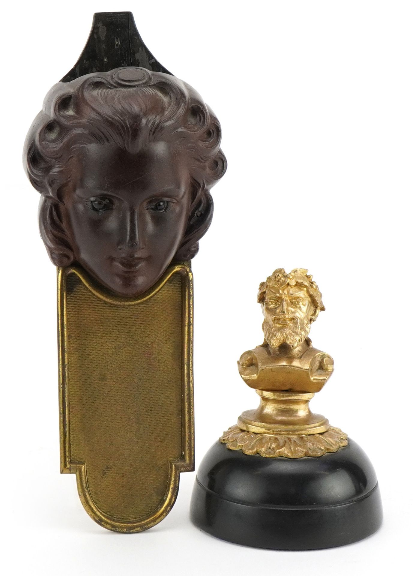 Gilt metal and black slate desk weight with a bust of a bearded man and a French style maiden head