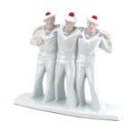 Art Deco style porcelain figure group of three sailors, 32cm wide