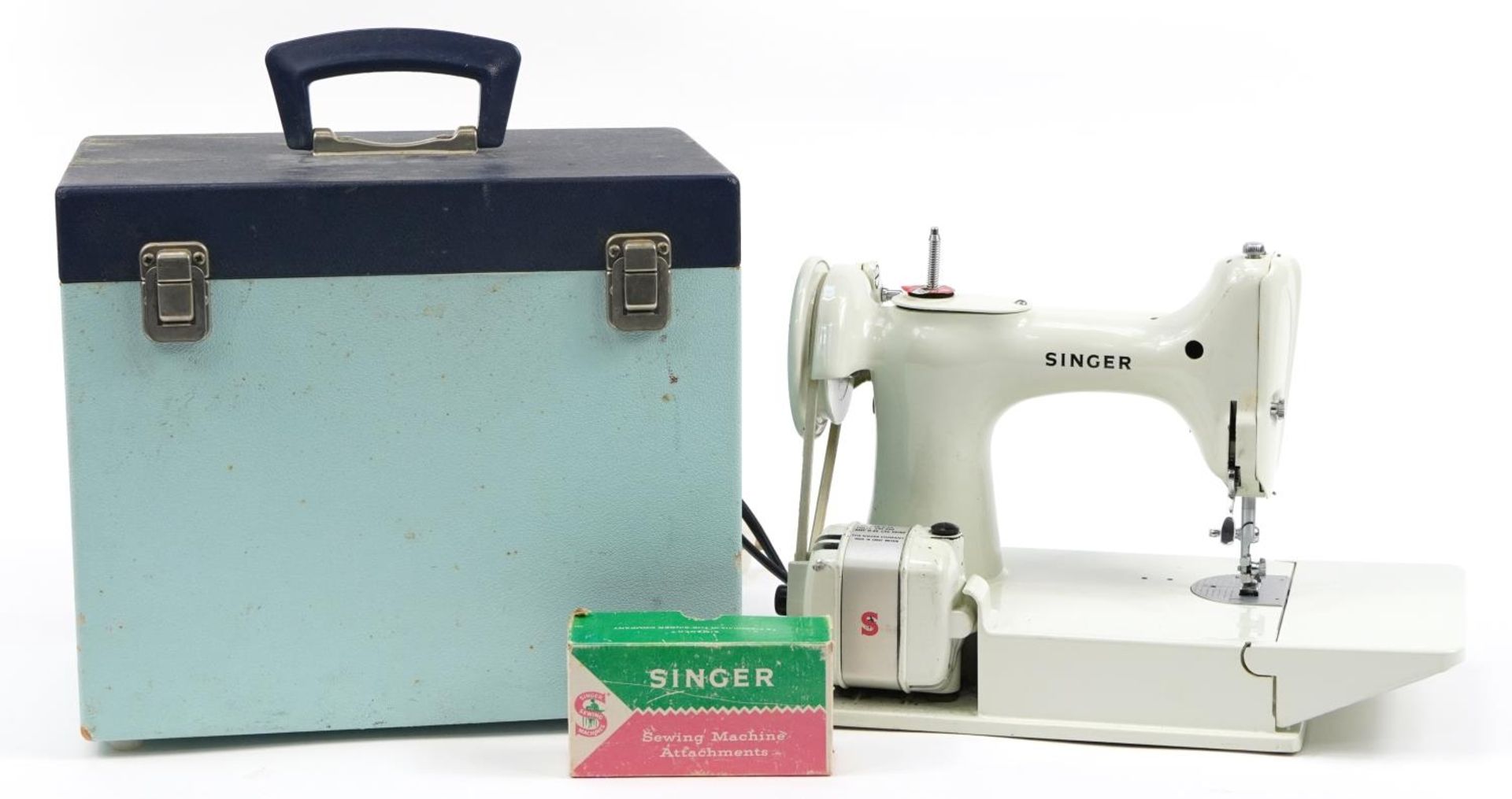Vintage enamelled Singer sewing machine model 221K with pale turquoise case