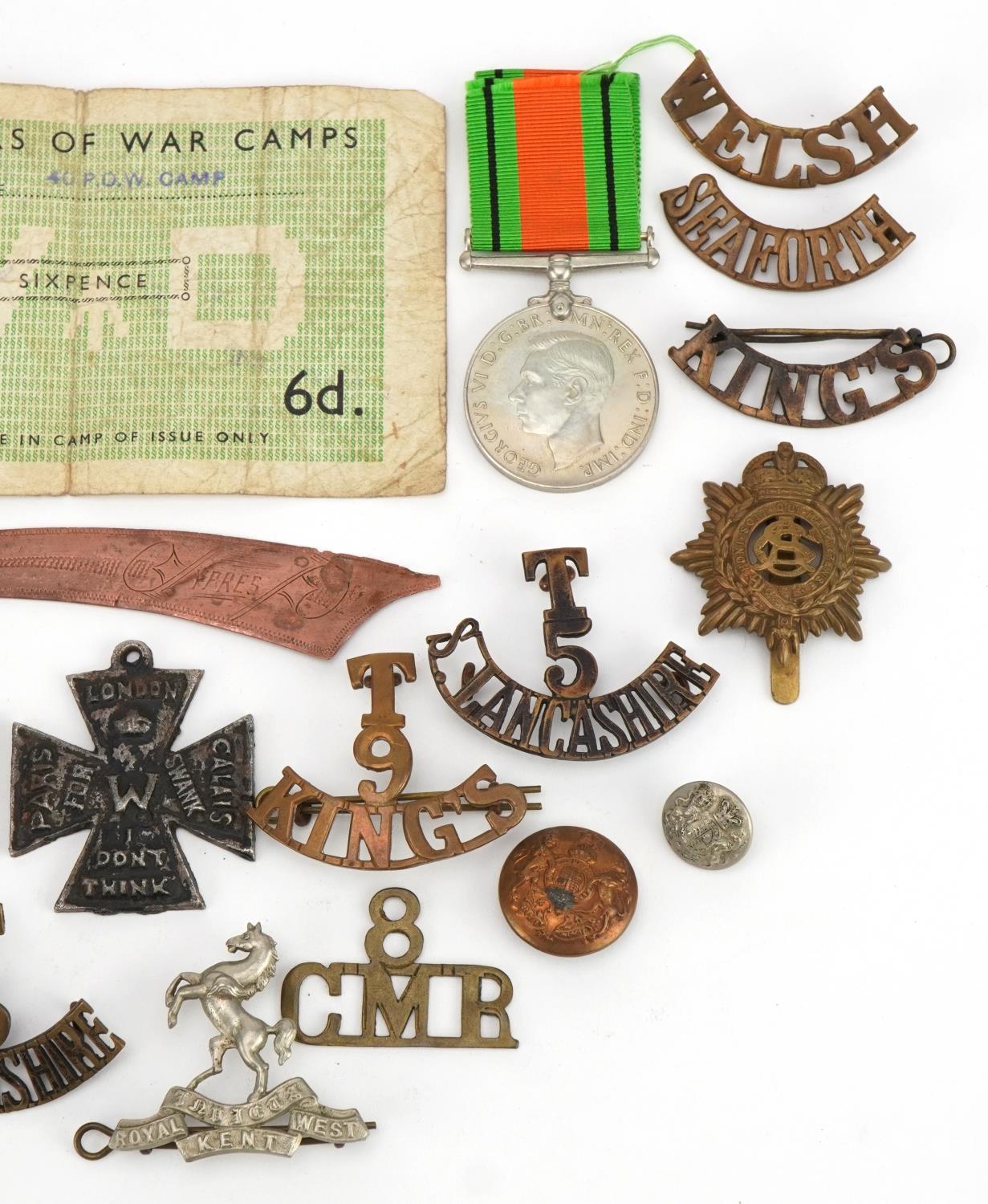 British militaria including shoulder titles, cap badges and World War II Defence medal - Image 3 of 4