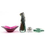 Art glassware comprising a twisted colourful glass vase, two bowls and a paperweight, the largest