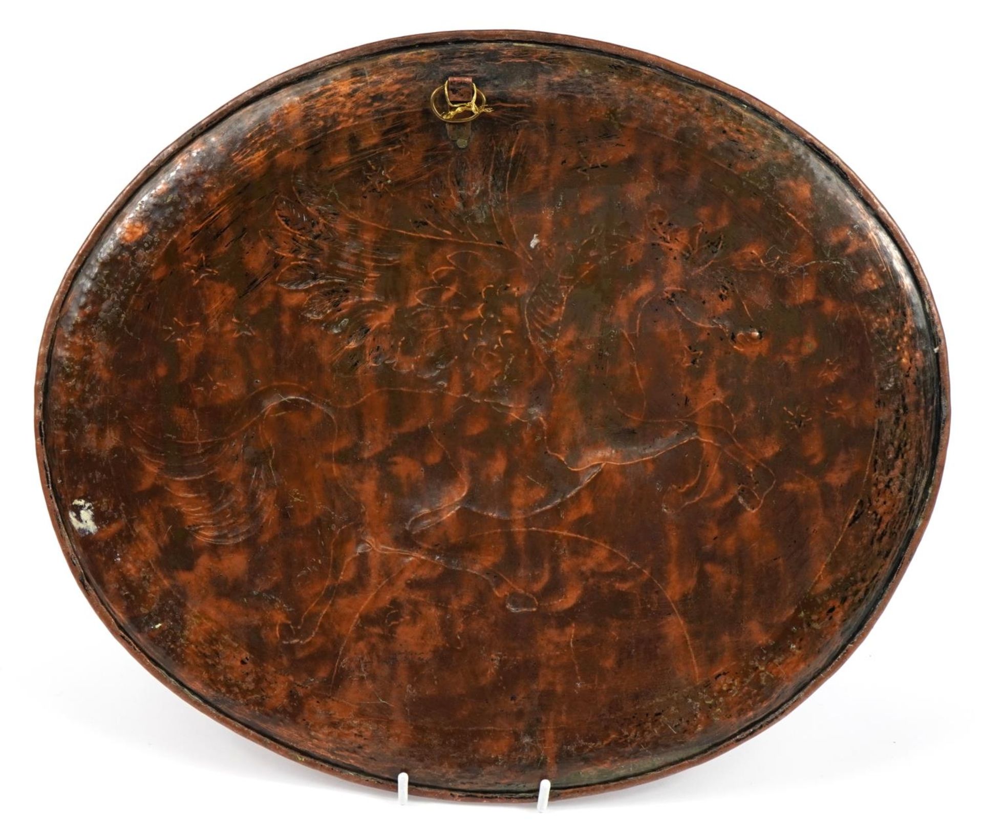 Manner of Newlyn, Arts & Crafts copper oval charger embossed with Pegasus, 43cm wide - Image 2 of 2