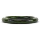 Chinese green hardstone bangle, 8cm in diameter
