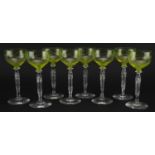 Set of eight cut glass wine glasses with uranium coloured glass bowls, each 18.5cm high