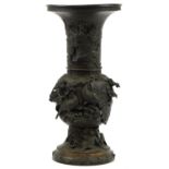 Large Japanese patinated bronze two section vase cast in relief with cranes and mythical figures