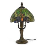 Bronzed metal Tiffany design table lamp with leaded glass dragonfly shade, 34cm high