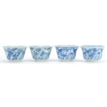 Set of four Chinese blue and white porcelain bowls hand painted with a chicken and flowers, blue