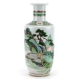 Chinese porcelain Rouleau vase hand painted in the famille rose palette with a figure in a