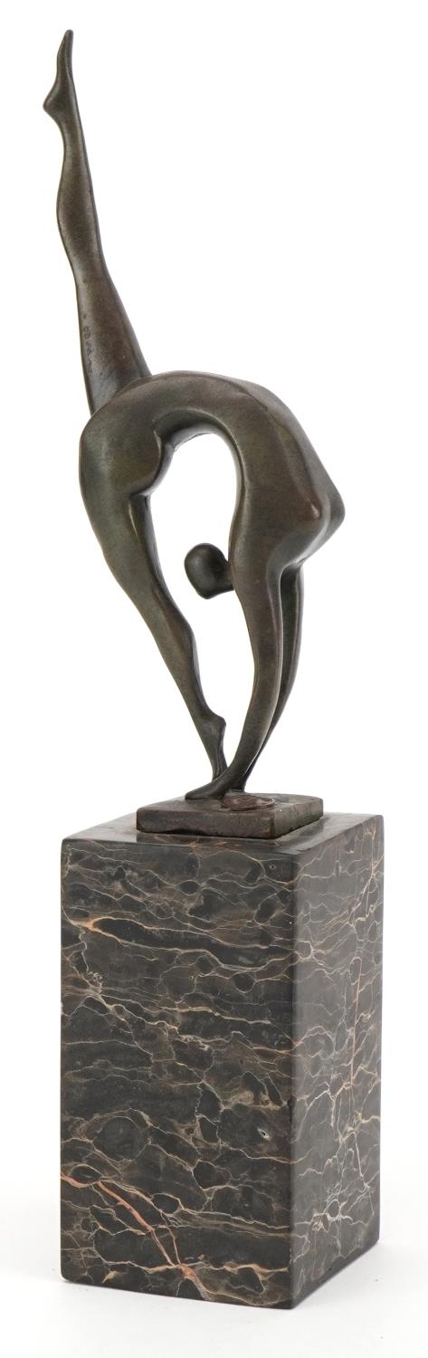 After Miguel Fernando Lopez (Milo), bronze study of a nude female dancer raised on a marble plinth