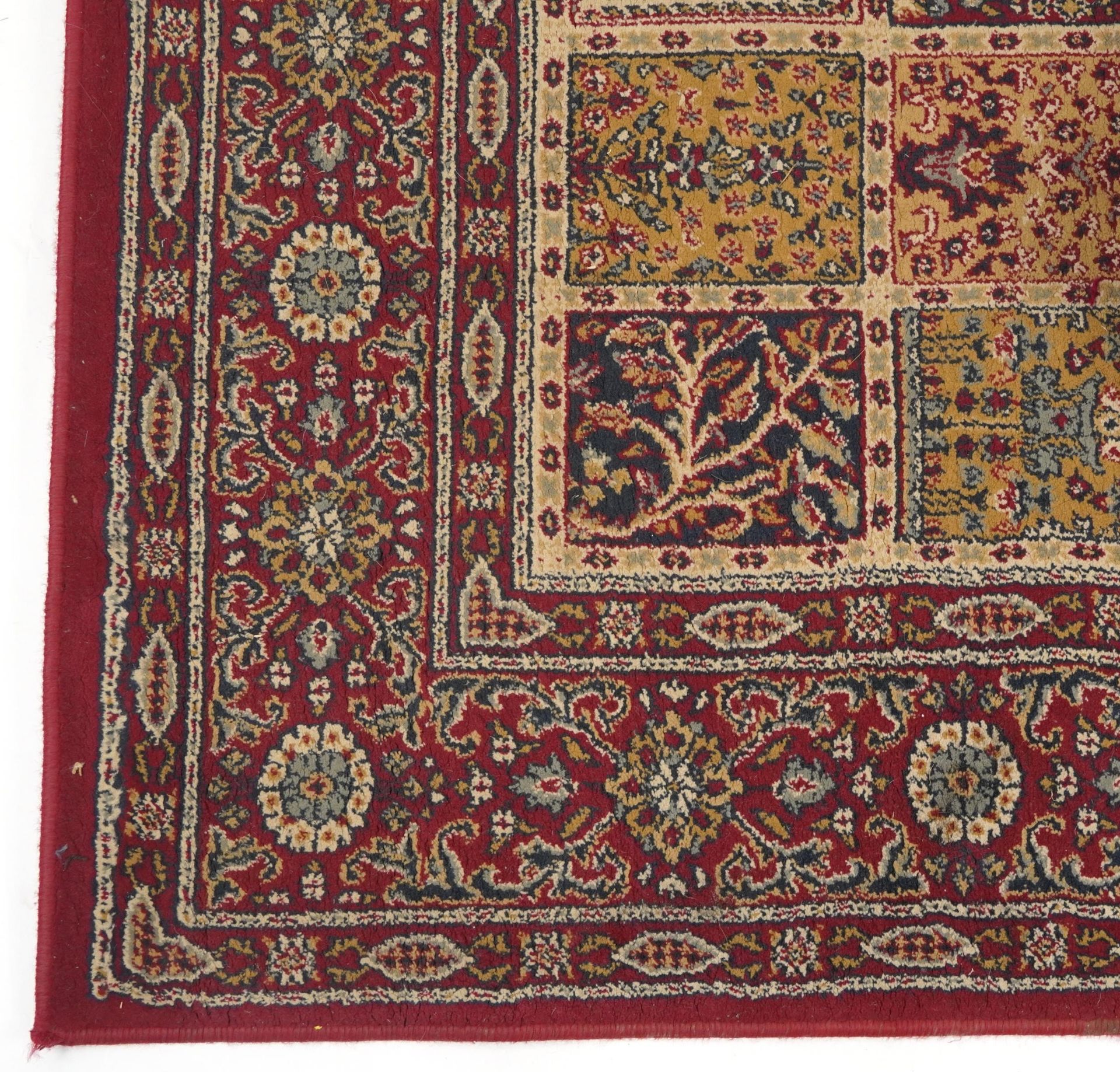 Rectangular Persian rug, the central field having a repeat tree design, the red ground borders - Bild 4 aus 7