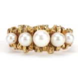 Manner of Stuart Devlin, Unmarked gold graduated pearl ring, tests as 15ct gold, size O, 3.0g
