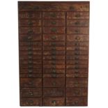Large hardwood haberdashery cabinet fitted with forty six drawers, each with divisional interior,