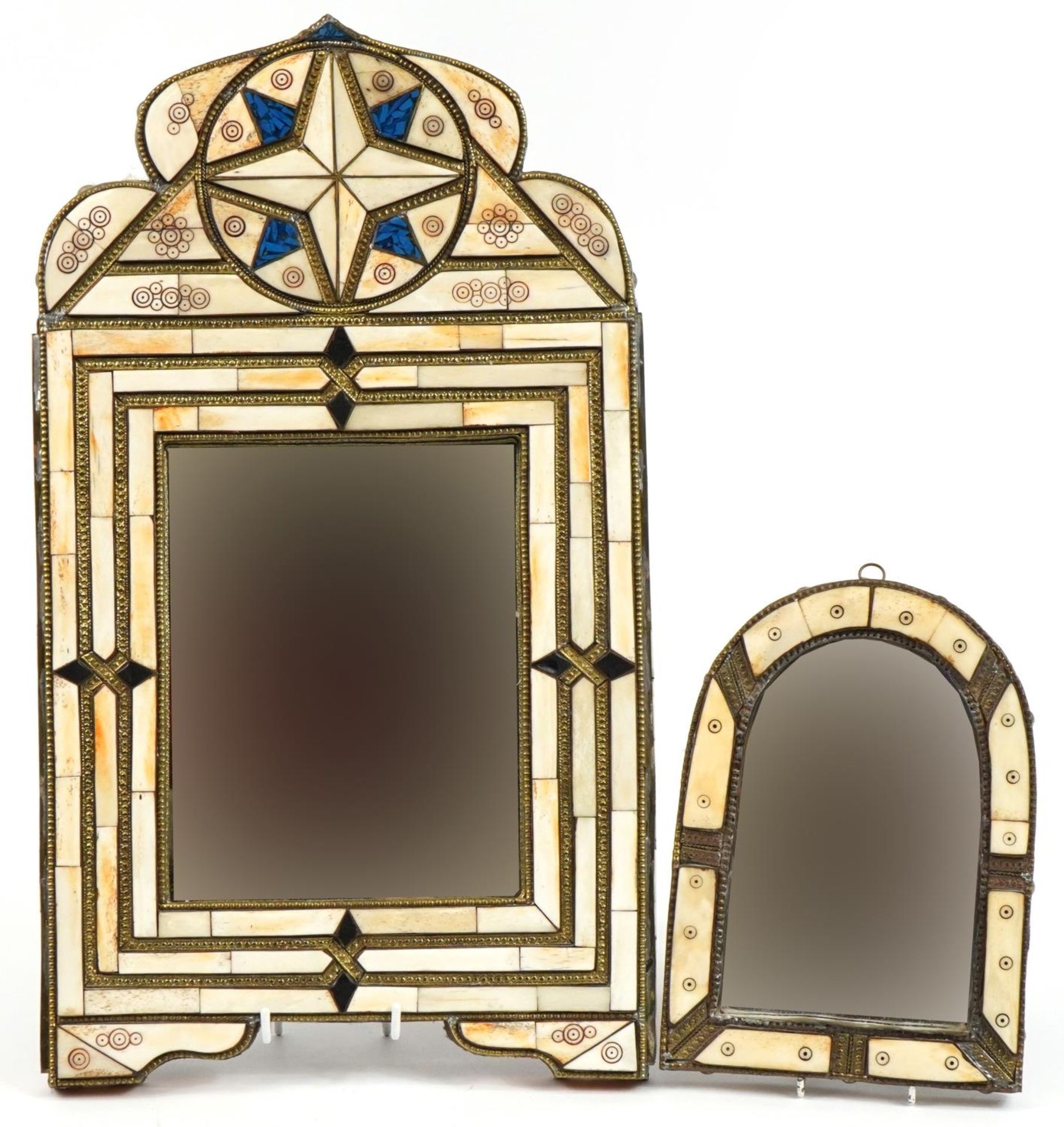 Two Middle Eastern bone mounted wall mirrors, the largest 56cm x 32cm
