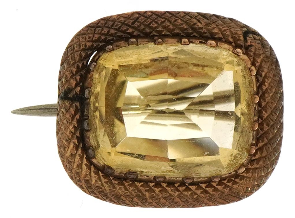 Victorian yellow metal citrine brooch with safety chain, tests as 9ct gold, 1.7cm wide, 2.5g