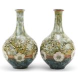 Eliza Simmance for Royal Doulton, pair of Art Nouveau stoneware vases hand painted with flowers,