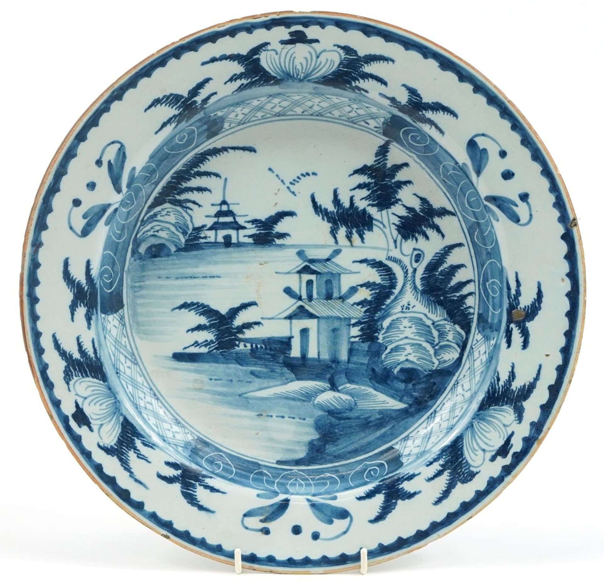 18th/19th century Delft blue and white tin glazed charger hand painted in the chinoiserie manner