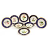 Victorian porcelain eight piece desert service hand painted and gilded with flowers, impressed marks