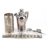 Silver plated items and an Indian white metal bottle holder including a cocktail shaker and candle