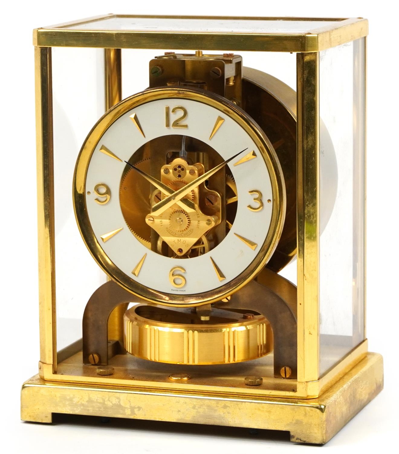 Jaeger LeCoultre brass cased Atmos clock, the circular chapter ring having Arabic numerals, serial