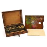 Winsor & Newton, 19th/20th century oak cased artist's travelling paint box with palette and paints