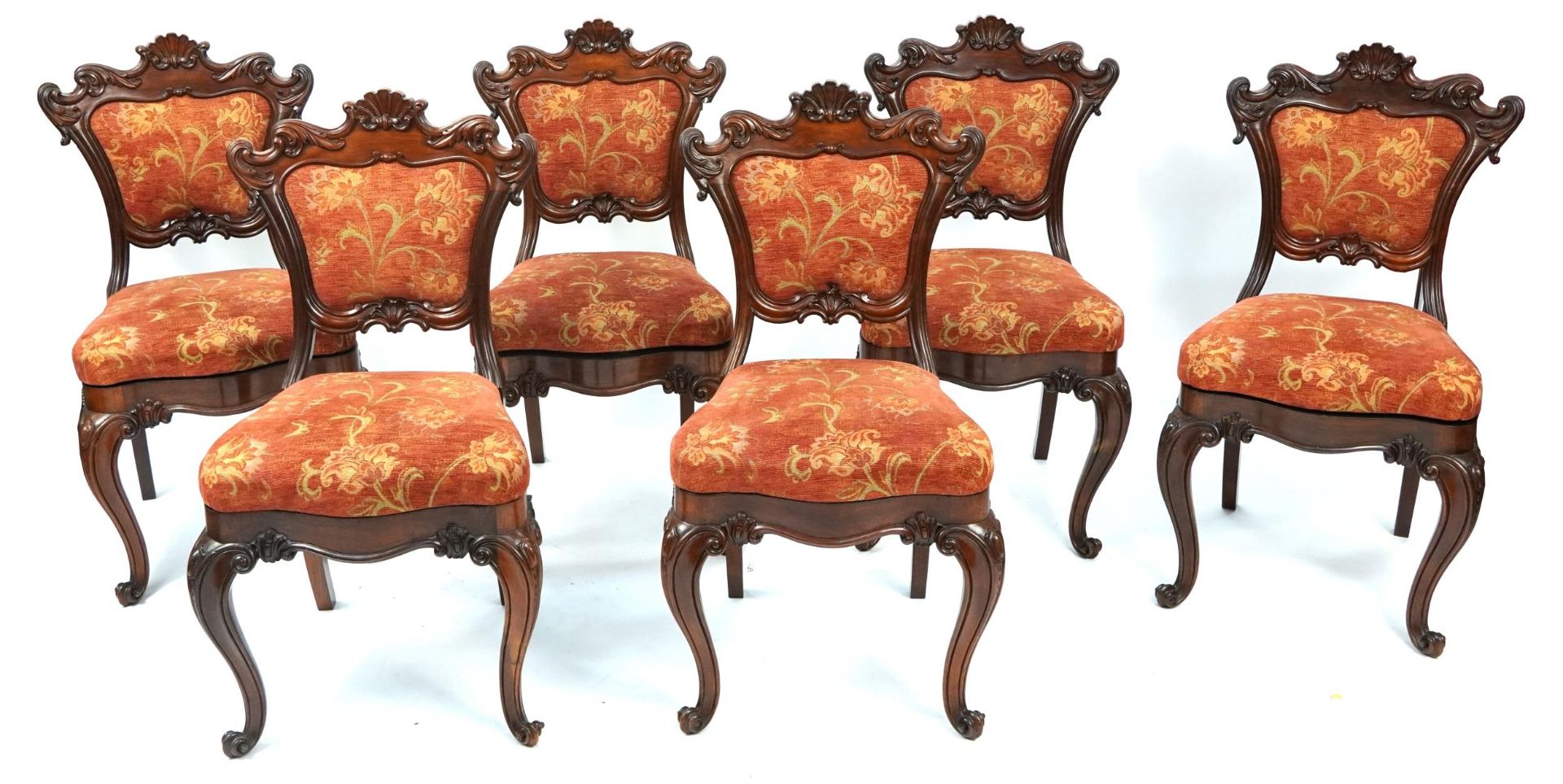 Set of six Victorian rosewood dining chairs with carved shell backs and scroll feet, 89cm high