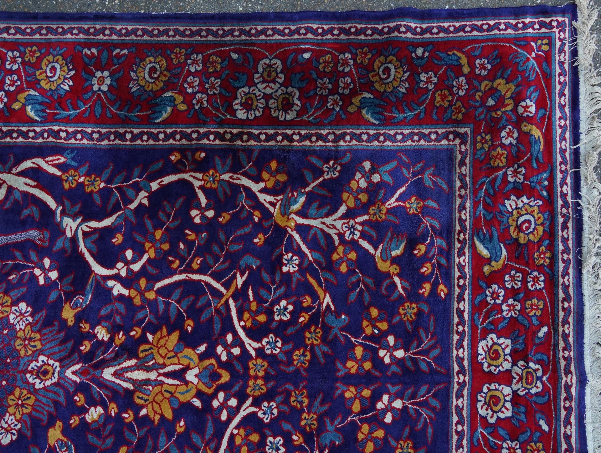 Rectangular Sarook Kashan silk rug decorated with birds amongst flowers onto a predominantly red and - Image 4 of 8