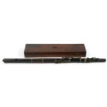 Boosey & Sons, Victorian rosewood four piece flute housed in a velvet lined mahogany case with R S